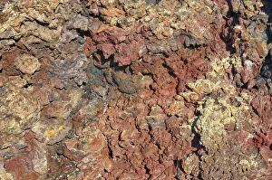 Volcanic rock, coloured by metallic oxides, Crates of the Moon National Monument, Arco Volcanic rock, coloured by metallic oxides, Crates of the Moon National Monument, Arco