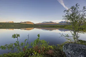 Vuolio Njahkajavri Lake, Lapporten trough valley, glacial trough, at the back, Abisko National Park, Norrbotten County Vuolio Njahkajavri Lake, Lapporten trough valley, glacial trough, at the back, Abisko National Park, Norrbotten County