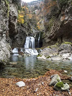 Waterfall in a forest in the Pyrenees in autumn Waterfall in a forest in the Pyrenees in autumn