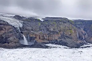 Waterfalls cascading into the canyon below Hoefoabrekkajoekull glacier, Pakgil, Iceland Waterfalls cascading into the canyon below Hoefoabrekkajoekull glacier, Pakgil, Iceland
