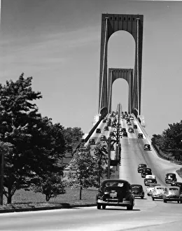 <b class=qtipBold><figcaption>Whitestone Bridge, New York City</figcaption></b><br>Traffic on the Bronx Whitestone Bridge, New York, New York, 1950s. (Photo by Sheldon Hine/FPG/Getty Images)<br><em>© 2005 Getty Images</em> Whitestone Bridge, New York City