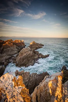 Wide angle landscape image of rock formations and the indian ocean along the Garden Route coast of South Africa Wide angle landscape image of rock formations and the indian ocean along the Garden Route coast of South Africa