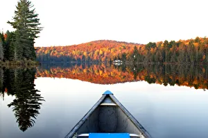 <b class=qtipBold><figcaption>Wilson lake 7am</figcaption></b><br>Calm and quiet was the morning when I arrived at the cottage. I quietly slipped into the canoe and paddled down the lake and turned back to shoot this scene, about 20 minutes later the wind came up and the stillness vanished from sight.<br><em>© Jim Cumming</em> Wilson lake 7am