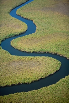 Winding river course, seen from above. River bends Winding river course, seen from above. River bends