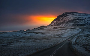 Winding road over sunset landscape of Iceland Winding road over sunset landscape of Iceland