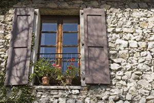 Window Of An Old Stone-Walled European House Window Of An Old Stone-Walled European House