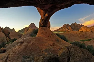 Two Windows To One World - Landscape photo of the Natural rock arch at Spitzkoppe in Two Windows To One World - Landscape photo of the Natural rock arch at Spitzkoppe in