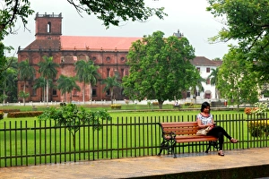 Woman in front of Basilica of Bom Jesus at Old Goa Woman in front of Basilica of Bom Jesus at Old Goa