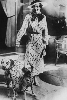 Woman with two dalmatians wearing patterned dress (B&W) Woman with two dalmatians wearing patterned dress (B&W)