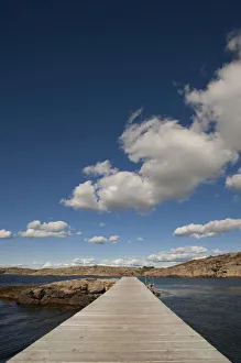 Wooden landing stage at a place for bathing on one of the skerries of Molloesund Wooden landing stage at a place for bathing on one of the skerries of Molloesund
