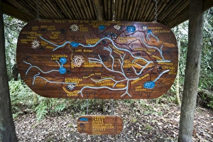Wooden sign depicting hiking trails of the Central Circuit, Rwenzori Mountains, Uganda Wooden sign depicting hiking trails of the Central Circuit, Rwenzori Mountains, Uganda