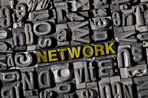 The word NETWORK among on the letterpress letters The word NETWORK among on the letterpress letters