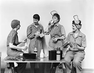 World War II (1939-1945) Gallery: Four World War 2 Women Taking A Lunch Break All Wearing Coveralls & 2 Wearing Raised Face