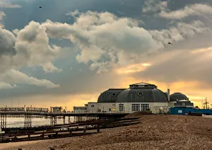 The Great British Seaside Gallery: Worthing, Sussex evening view, sun behind the pier