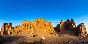 Yardang landform at sunset, Xinajing, China Yardang landform at sunset, Xinajing, China