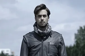 Young man wearing a leather jacket, portrait Young man wearing a leather jacket, portrait