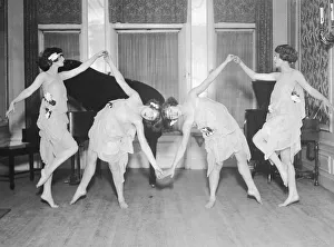 Four young women performing modern dance (B&W) Four young women performing modern dance (B&W)