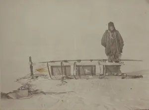 Adams standing by the sledge which was used on the furthest south journey Adams standing by the sledge which was used on the furthest south journey