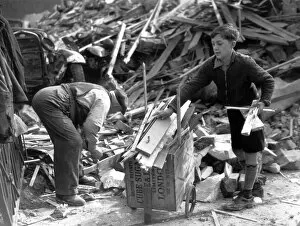11 year old Lambeth boy sells firewood from bombed houses for Londons War Weapon Week