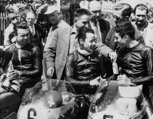 The 1st, 2nd and 3rd seen in the paddock after winning the 125 cc TT race on the Isle of The 1st, 2nd and 3rd seen in the paddock after winning the 125 cc TT race on the Isle of