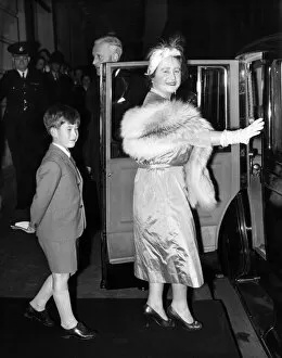 The Queen Mother Collection: 20 October 1956 Prince Charles follows the Queen Mother to their car after watching