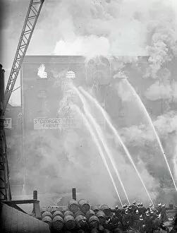 250 firemen fight london rice warehouse blaze. Engines from every one of the 60
