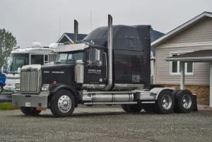 A 6 x4 western star tractor unit parked on the owners front drive in rural Ontario Canada A 6 x4 western star tractor unit parked on the owners front drive in rural Ontario Canada