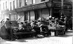 British troops hold a barrier in a Dublin Street during the week long Irish Rebellion of 1916