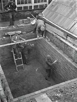 Bricks Gallery: Building the outer foundations for an air raid shelter in a garden in Hextable
