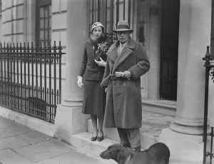 Colonel Claude Beddington and Miss Sheila Heddington leaving their London home for Colonel Claude Beddington and Miss Sheila Heddington leaving their London home for