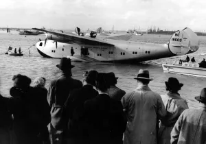 Crowds meet the giant new American flying boat Yankee Clipper as she moors at Crowds meet the giant new American flying boat Yankee Clipper as she moors at
