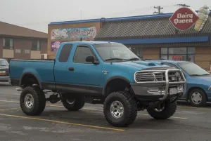 Sudbury Gallery: A customized Ford F150 with big wheels and tyres outside a Dairy Queen fast food
