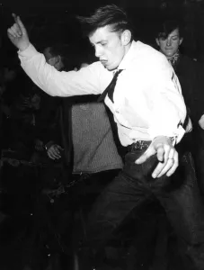 Dancing to rock n roll 1950s dance / dancing / party season / celebration / happy Dancing to rock n roll 1950s dance / dancing / party season / celebration / happy