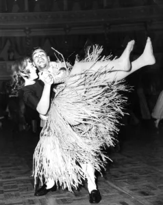 Dancing to rock and roll wearing a grass skirt dance / dancing / party season Dancing to rock and roll wearing a grass skirt dance / dancing / party season