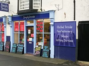 Images Dated 17th January 2005: Eye-catching off-licence called Simply Drinks with blackboards and posters advertising