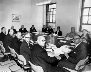 Shelter Gallery: The first meeting of the Milner Holland Committee, which is to inquire into the housing