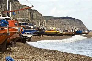 Fishing boats pulled up onto the shingle at Hastings, Sussex, UK credit: Marie-Louise