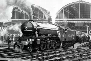 Railway Gallery: The Flying Scotsman pulls out of Londons Kings Cross station to make the last