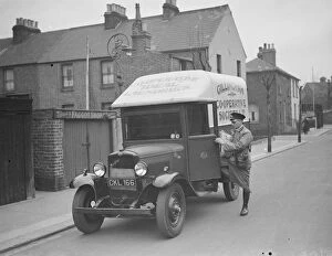 Terraced Houses Gallery: Gillingham Cooperative Society laundry delivery van with driver. 1938