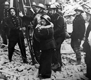 Crying Gallery: The London Blitz An ARP warden rescues a young girl from the wreckage of a building