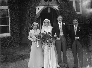 The Miles and Crabb wedding at Orpington, Kent. The bride and groom with the bridesmaid The Miles and Crabb wedding at Orpington, Kent. The bride and groom with the bridesmaid