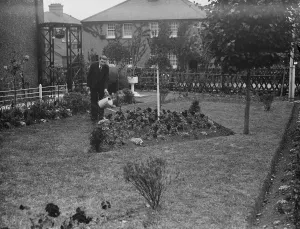 Mr F W Sims stands over his prize garden in Horton Kirby. 1938 Mr F W Sims stands over his prize garden in Horton Kirby. 1938