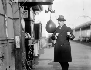 Mr George Robey, music hall star and comedian, at the punch ball Mr George Robey, music hall star and comedian, at the punch ball