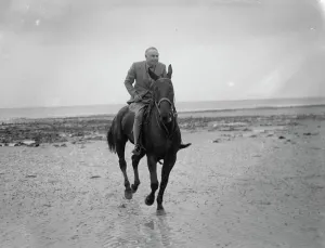 Mr Hore Belisha spends his holiday - on horseback. Away from transport problems Mr Hore Belisha spends his holiday - on horseback. Away from transport problems