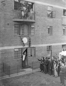 Premiers wife opens new Kensington flats. Mrs Neville Chamberlain, wife of the Premier Premiers wife opens new Kensington flats. Mrs Neville Chamberlain, wife of the Premier