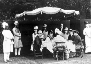 Queen Victoria at breakfast in Osborne Gardens with the Duke of Connaught, Princess Beatrice Queen Victoria at breakfast in Osborne Gardens with the Duke of Connaught, Princess Beatrice
