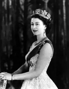 Prints of A Royal Command Portrait at Buckingham Palace Queen Elizabeth II wearing an evening gown with the blue ribbon of Star of the Garter a diamond necklace ( a wedding present from the City of London) United Kingdom Prints: Queen Elizabeth II in a Royal Command Portrait Print
