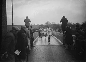 Runners crossing the bridge during the Oxford University versus Cambridge University