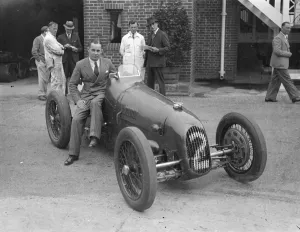 Smaller driver has smallest car for season fast race. Famous racing drivers, including Smaller driver has smallest car for season fast race. Famous racing drivers, including
