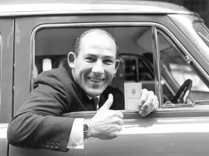 Stirling Moss with New Driving Licence after Year of Disqualification. he Celebrated Stirling Moss with New Driving Licence after Year of Disqualification. he Celebrated